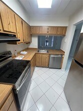 10041 Winding Lake Rd in Sunrise, FL - Building Photo - Building Photo