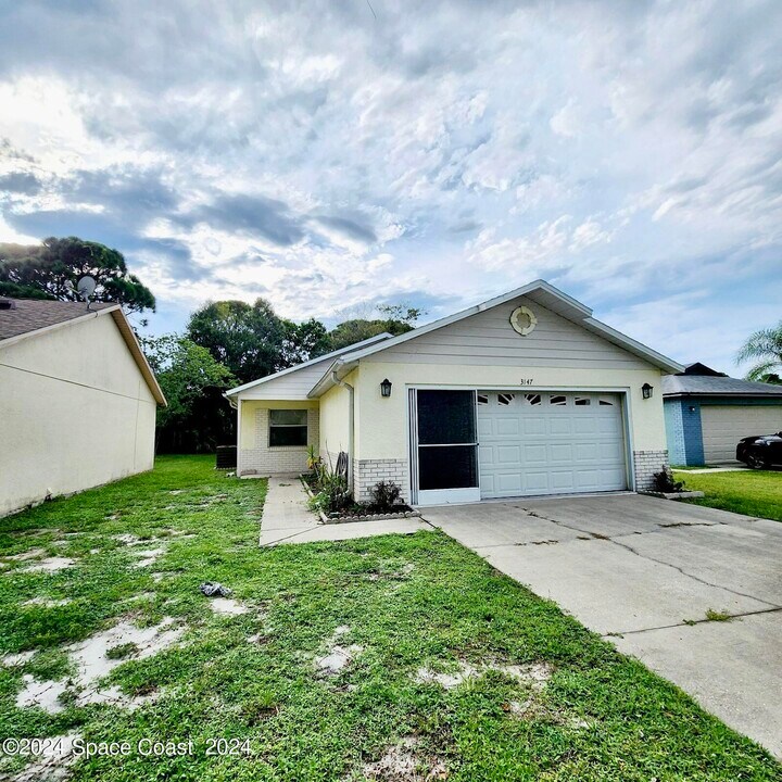 3147 Dunhill Dr in Cocoa, FL - Building Photo