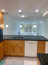 3351 S Palm Aire Dr in Pompano Beach, FL - Building Photo - Building Photo