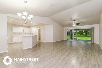 1057 Lilac St E in Lehigh Acres, FL - Building Photo - Building Photo