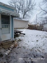 1124 W Bergin Ave in Flint, MI - Building Photo - Building Photo