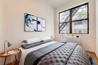 231 E 14th St in New York, NY - Building Photo - Building Photo