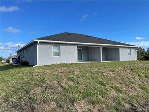 320-322 Ivan Ave S in Lehigh Acres, FL - Building Photo - Building Photo