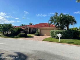 12 Marina Isles Blvd in Indian Harbour Beach, FL - Building Photo