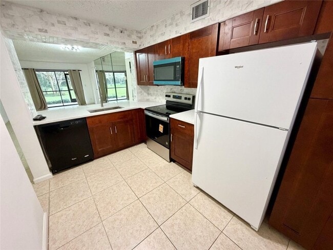 3355 Jaywood Terrace, Unit J111 in Boca Raton, FL - Building Photo - Building Photo
