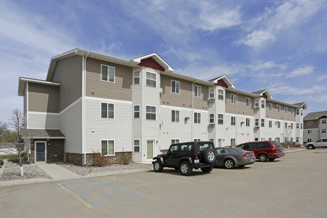 The Pines Luxury Security Apartments in Minot, ND - Building Photo - Building Photo