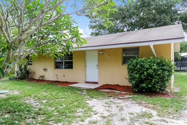 property at 1211 SE Sea Oat Ln