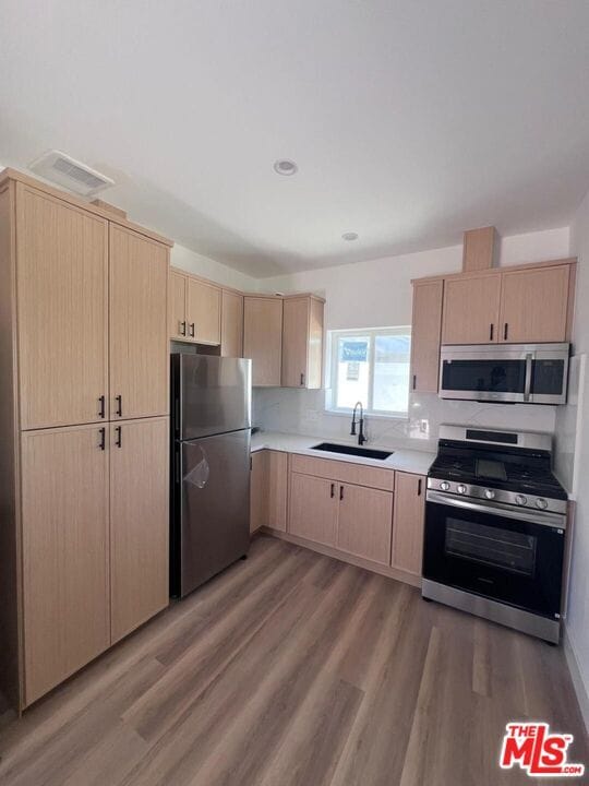 property at 7669 Beeman Ave