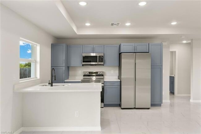 917 Hepburn Ave, Unit 09 in Lehigh Acres, FL - Building Photo - Building Photo