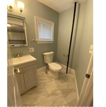 309 Highland Ave, Unit A in Somerville, MA - Foto de edificio - Building Photo