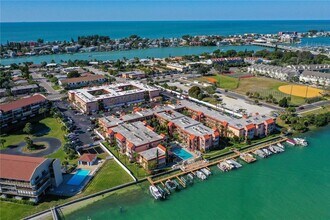 8911 Blind Pass Rd, Unit 121 in St Pete Beach, FL - Building Photo - Building Photo