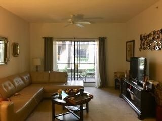 3021 Alcazar Pl-Unit -107 in Palm Beach Gardens, FL - Foto de edificio