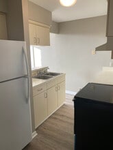 405 N Main St, Unit apt A in Milford, MI - Foto de edificio - Building Photo