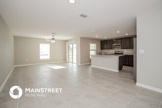 1673 Hideaway Flat St in Mascotte, FL - Building Photo - Building Photo