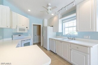 7640 Rozzini Ln in Naples, FL - Building Photo - Building Photo