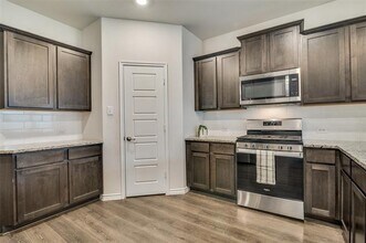 831 Hancock Ct in Fate, TX - Building Photo - Building Photo