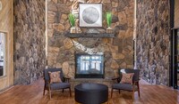 Entertain guests in the beautiful clubhouse - Creekside Apartamentos in Denver, Colorado