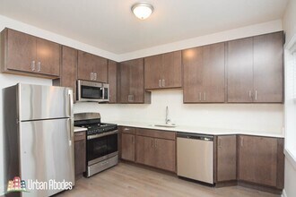 3409 W Fullerton Ave, Unit M102 in Chicago, IL - Building Photo - Building Photo
