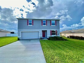 999 Cumberland Dr in Poinciana, FL - Building Photo