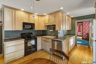 87 Migeon Ave in Torrington, CT - Foto de edificio - Building Photo