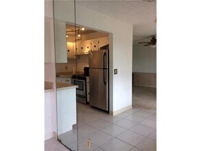 500 Village Green Cir W in Palm Springs, FL - Building Photo - Building Photo