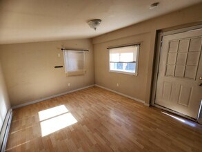 1587 W Nevada Pl in Denver, CO - Building Photo - Building Photo