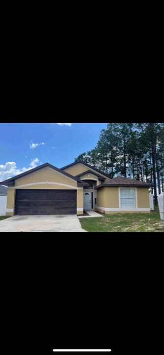 413 Woodlark Dr in Davenport, FL - Building Photo