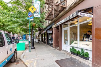 58-60 W 8th St in New York, NY - Building Photo - Building Photo