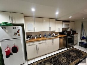 1BR 1BA Townhouse All Utilities Included On Tree Lined Bushwick/Ridgewood Border in Brooklyn, NY - Building Photo - Building Photo