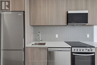 7439 Kingston Rd in Toronto, ON - Building Photo - Building Photo