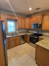413 Geneva Ave, Unit Carraige House Apartment in Panama City Beach, FL - Building Photo - Building Photo