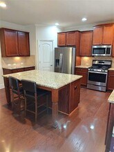 6210 Pine Bluff Dr in Cumming, GA - Building Photo - Building Photo