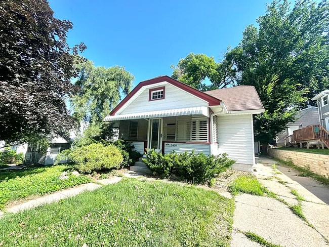 property at 5408 Poppleton Ave