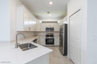 19601 Hinkley Dr in Estero, FL - Building Photo - Building Photo