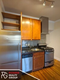 722 W Addison St, Unit E2 in Chicago, IL - Building Photo - Building Photo