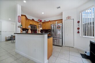10975 SW 246th St in Princeton, FL - Building Photo - Building Photo