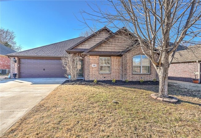 property at 103 NE Chicory Ln