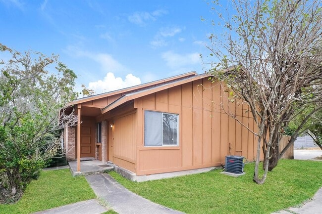 property at 323 W William Cannon Dr