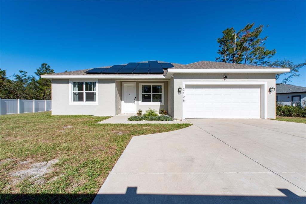 2105 Hibiscus Pl in Poinciana, FL - Building Photo