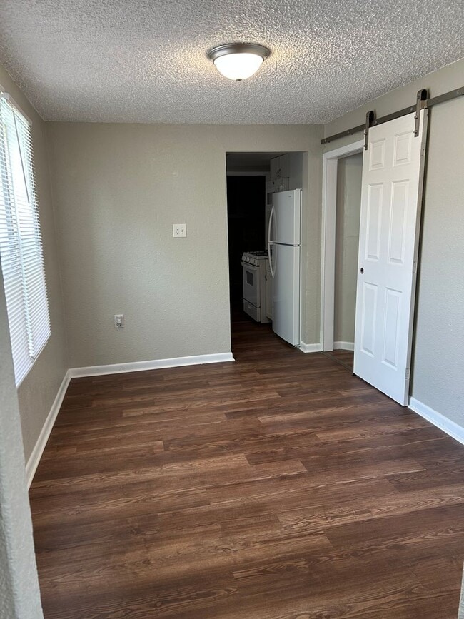 property at 207 E 1st St
