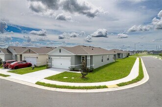 3302 Pine Lily Ave in Poinciana, FL - Building Photo - Building Photo