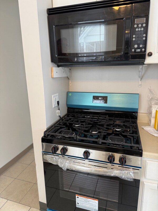 505 6th St NE, Unit downstairs in Massillon, OH - Building Photo - Building Photo