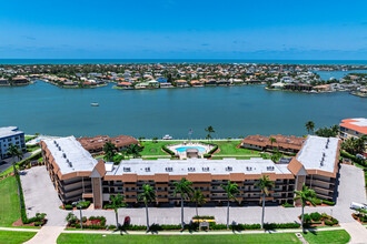 Smokehouse Harbour Condominium in Marco Island, FL - Building Photo - Building Photo