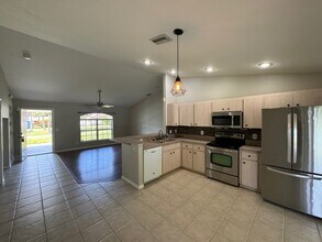 3928 Champagne Ave in North Port, FL - Foto de edificio - Building Photo