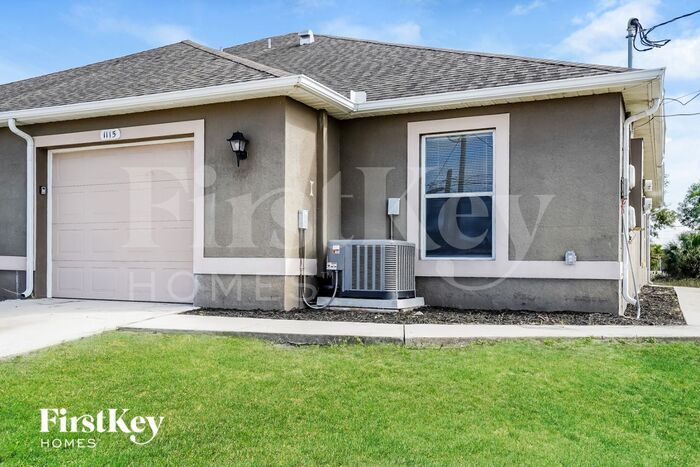 1115 Harry Ave S in Lehigh Acres, FL - Building Photo