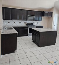 1000 Desert Rose Cove in Kyle, TX - Building Photo - Building Photo