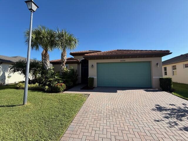 12091 SW Bennington Cir in Port St. Lucie, FL - Building Photo - Building Photo