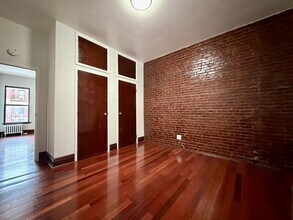 24-26-26 W 125th St in New York, NY - Building Photo - Building Photo