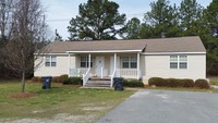 Deer Run Apartments in Cochran, GA - Building Photo - Building Photo