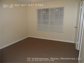 5587 Devonbriar Way-Unit -Unit J201 in Orlando, FL - Building Photo - Building Photo